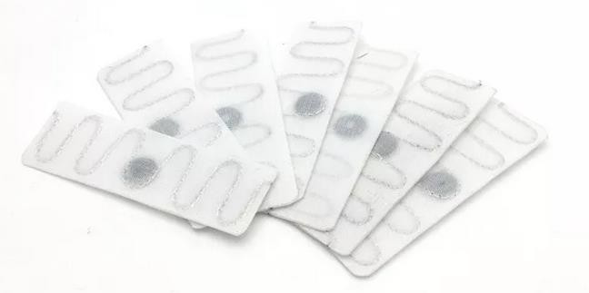 Etiqueta RFID UHF resistente al calor para seguimiento de lavandería de hoteles y hospitales.
