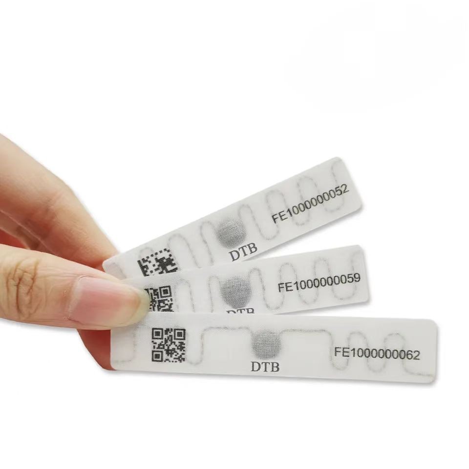 Etiqueta de lavandería lavable RFID UHF Etiqueta de lavado de tela Etiqueta de prenda