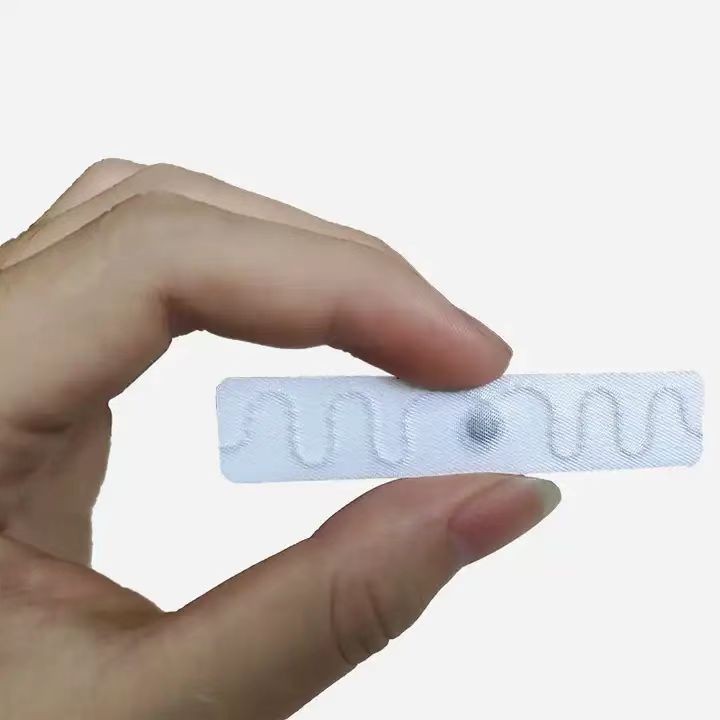 Etiquetas RFID lavables con seguimiento de textiles y ropa de cama, etiqueta de lavandería RFID UHF de largo alcance