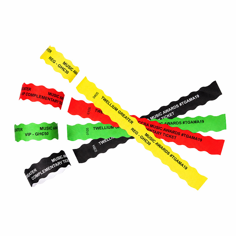 Custom Tyvek paper wristbands in different colors and scalloped-edge designs