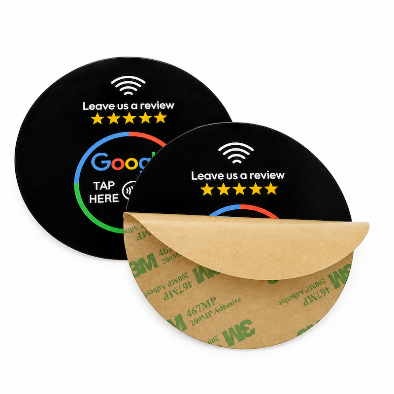Black NFC Google review window stickers with partially peeled release liner